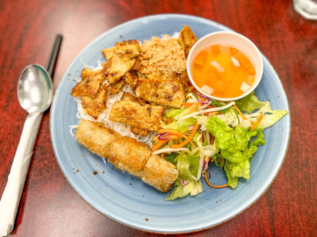 A plate of Vietnamese vermicelli noodle salad with pork and spring rolls at Fisherman's Plate Restaurant in Wellington.
