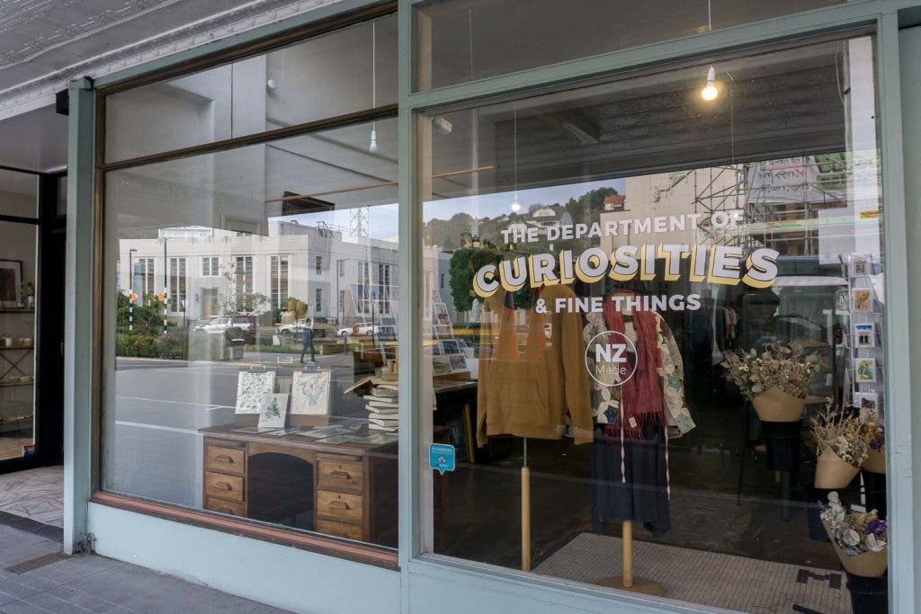 The front window of the Department of Curiosities & Fine Things, an artisan shop in Napier.