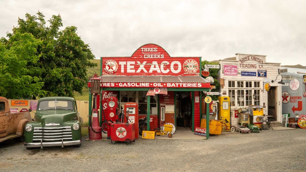 Vintage buildings and cars at Three Creeks in Burkes Pass on the drive from Christchurch to Lake Tekapo.