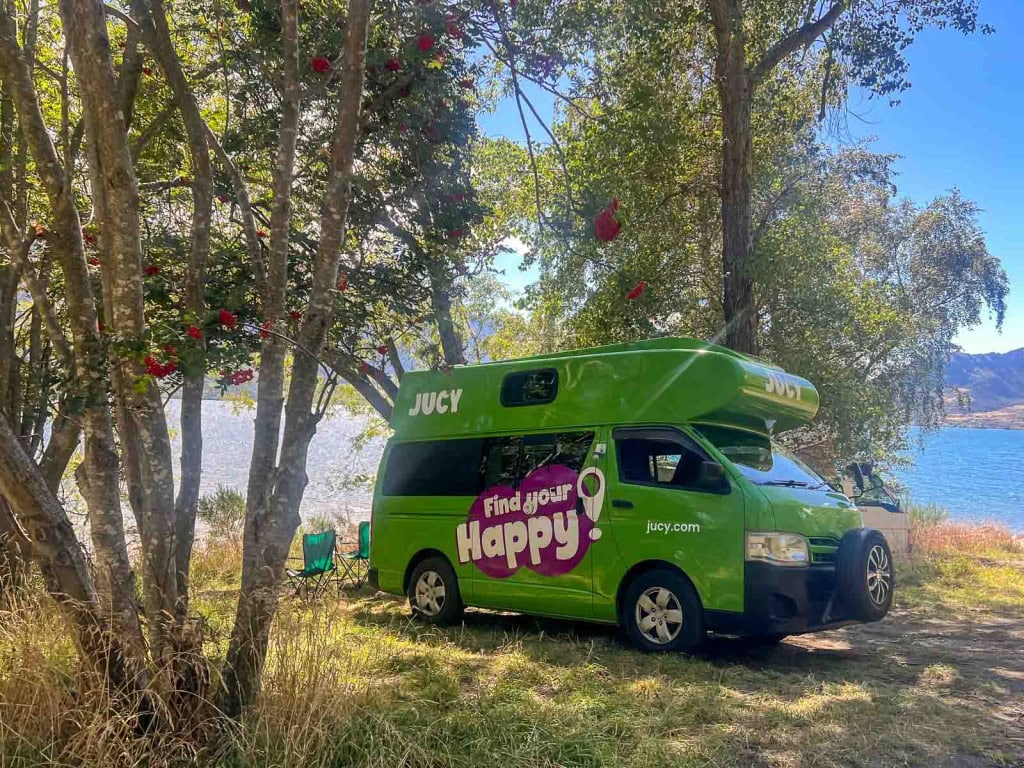 A JUCY campervan parked at the Kingston Lake Camp on Lake Wakatipu on the drive between Queenstown and Te Anau.